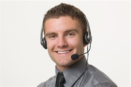 simsearch:700-01248091,k - Portrait of Man wearing Headset Stock Photo - Premium Royalty-Free, Code: 600-02428779