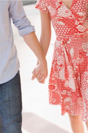 romantic couples anonymous - Young Couple Holding Hands Walking Stock Photo - Premium Royalty-Free, Code: 600-02429156