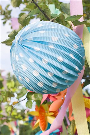 Paper Lantern Decorations at Birthday Party Stock Photo - Premium Royalty-Free, Code: 600-02461304