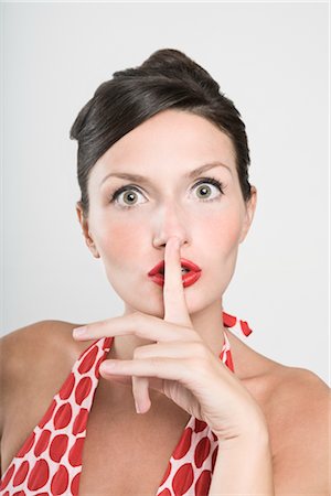 shhh - Portrait of Woman Shushing Stock Photo - Premium Royalty-Free, Code: 600-02504689