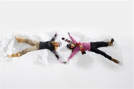 friends silly - Women Making Snow Angels, Near Frisco,  Summit County, Colorado, USA Stock Photo - Premium Royalty-Free, Code: 600-02586058