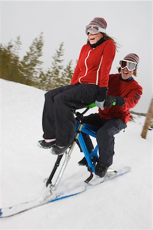 Couple Riding Skibikes, Near Frisco, Summit County, Colorado, USA Stock Photo - Premium Royalty-Free, Code: 600-02586062