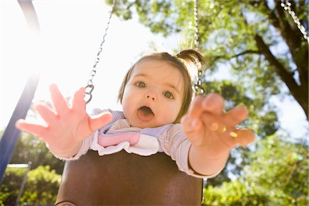 expressions of fear - Girl on Swing, USA Foto de stock - Sin royalties Premium, Código: 600-02586116