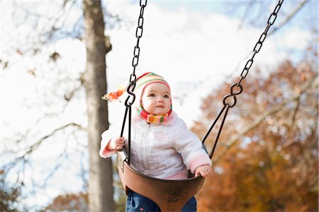 simsearch:700-02586125,k - Girl on Swing in Autumn, USA Stock Photo - Premium Royalty-Free, Code: 600-02586118