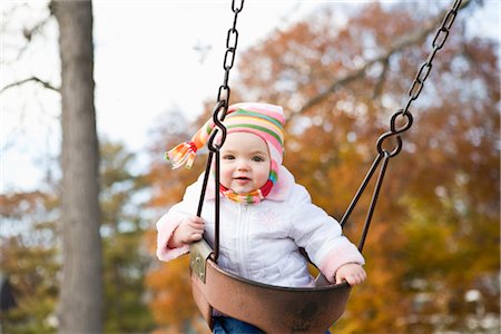 simsearch:700-02586125,k - Girl on Swing in Autumn, USA Stock Photo - Premium Royalty-Free, Code: 600-02586119