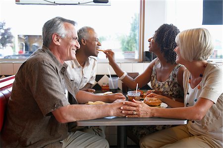 restaurant adults group - Couples Eating in Retro Diner Stock Photo - Premium Royalty-Free, Code: 600-02593748