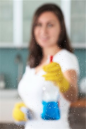 Woman Cleaning Glass Stock Photo - Premium Royalty-Free, Code: 600-02593992