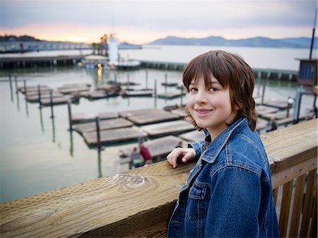 Boy on Pier by Harbor, San Francisco, California, USA Stock Photo - Premium Royalty-Free, Code: 600-02637687