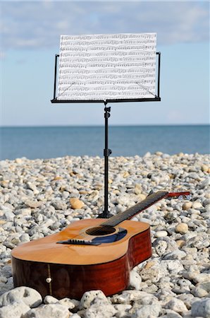 Music Stand and Guitar on Beach Stock Photo - Premium Royalty-Free, Code: 600-02659560