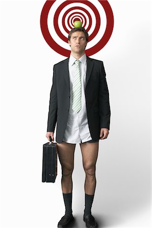 Businessman with Apple on Head and No Pants Stock Photo - Premium Royalty-Free, Code: 600-02659994