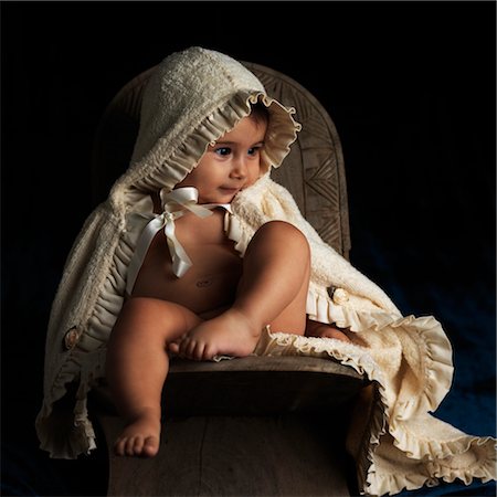 Young Child Wearing Hooded Blanket Stock Photo - Premium Royalty-Free, Code: 600-02669659