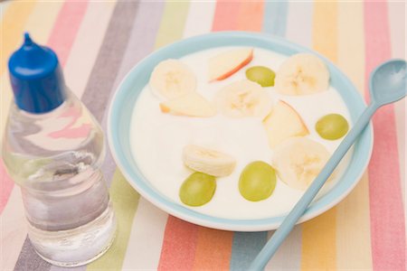 Bowl of Fruit and Yogurt and Bottle of Artificial Sweetener Stock Photo - Premium Royalty-Free, Code: 600-02660179