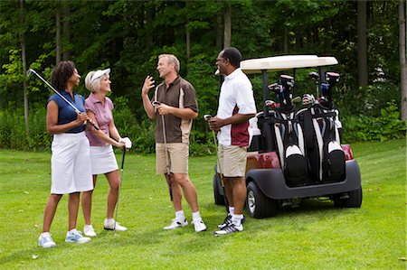 simsearch:600-02935461,k - Group of People Playing Golf, Burlington, Ontario, Canada Stock Photo - Premium Royalty-Free, Code: 600-02670307