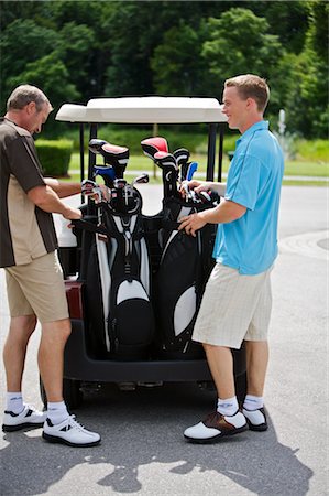 Father and Son Golfing, Burlington, Ontario, Canada Stock Photo - Premium Royalty-Free, Code: 600-02670414