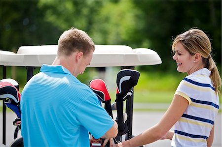 queue club - Couples at Golf Course, Burlington, Ontario, Canada Foto de stock - Sin royalties Premium, Código: 600-02670413