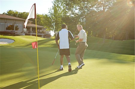 Men Golfing, Burlington, Ontario, Canada Stock Photo - Premium Royalty-Free, Code: 600-02670455