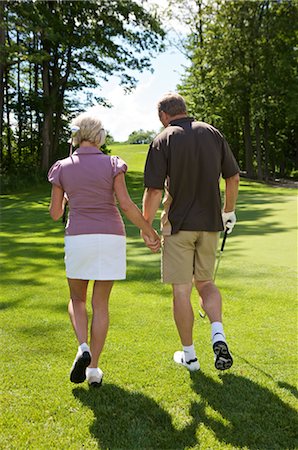 sport women candid - Couple Golfing, Burlington, Ontario, Canada Stock Photo - Premium Royalty-Free, Code: 600-02670463