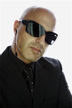 Portrait of Man Wearing Sunglasses Stock Photo - Premium Royalty-Free, Code: 600-02670674