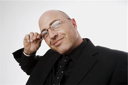 pictures of bald men in glasses - Portrait of Man Stock Photo - Premium Royalty-Free, Code: 600-02670680