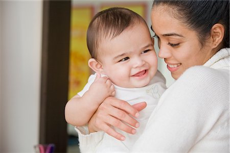 emotional images of mother holding baby - Mother Holding Happy Baby Stock Photo - Premium Royalty-Free, Code: 600-02671226