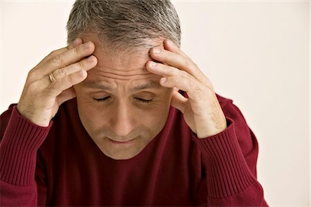 Man with Headache Stock Photo - Premium Royalty-Free, Code: 600-02694655