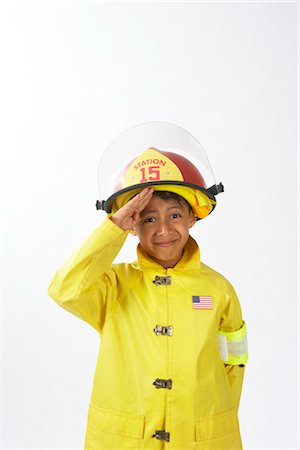 simsearch:700-02046160,k - Boy Dressed as Firefighter Foto de stock - Sin royalties Premium, Código: 600-02693681