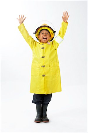 people in panic - Boy Dressed as Firefighter Stock Photo - Premium Royalty-Free, Code: 600-02693682