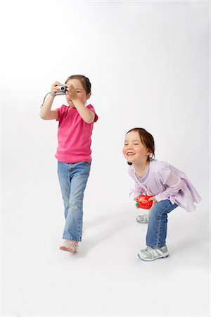 standing - Girls with Cameras Stock Photo - Premium Royalty-Free, Code: 600-02693716