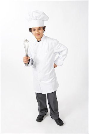 simsearch:600-02693750,k - Boy Dressed Up as a Chef Holding a Whisk Stock Photo - Premium Royalty-Free, Code: 600-02693737