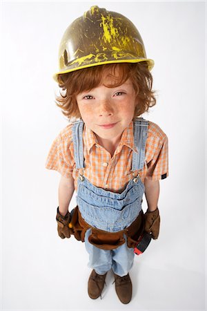 simsearch:600-02693750,k - Little Boy Dressed Up as Construction Worker Stock Photo - Premium Royalty-Free, Code: 600-02693747