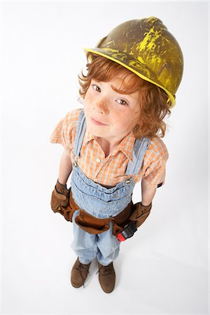 simsearch:600-02693750,k - Little Boy Dressed Up as Construction Worker Stock Photo - Premium Royalty-Free, Code: 600-02693748