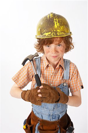 simsearch:600-02693750,k - Little Boy Dressed Up as Construction Worker Holding a Hammer Stock Photo - Premium Royalty-Free, Code: 600-02693750