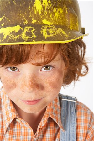 simsearch:600-02693750,k - Little Boy Dressed Up as Construction Worker Stock Photo - Premium Royalty-Free, Code: 600-02693751