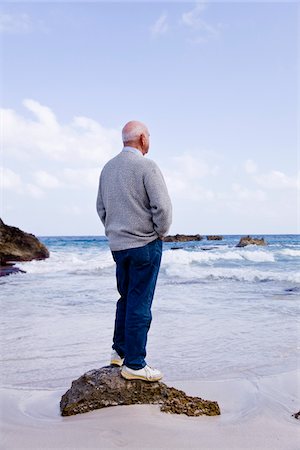 simsearch:700-01163568,k - Man Standing on Rock Looking Out to Sea Stock Photo - Premium Royalty-Free, Code: 600-02693906