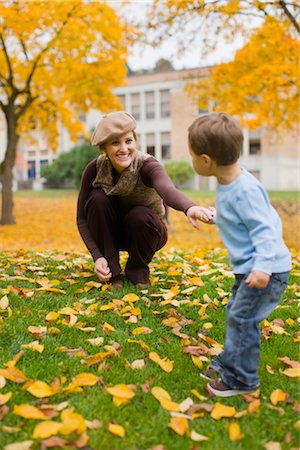 fall mother leaves - Mother and Son Playing in the Park in Autumn, Portland, Oregon, USA Stock Photo - Premium Royalty-Free, Code: 600-02700631