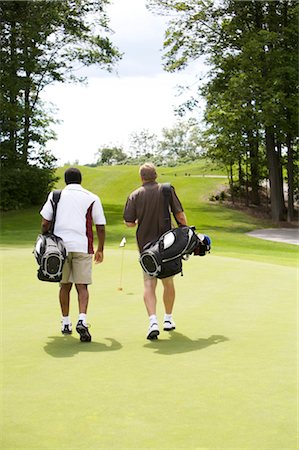 picture of people walking and chatting - Men Walking on Golf Course, Burlington, Ontario, Canada Stock Photo - Premium Royalty-Free, Code: 600-02701104