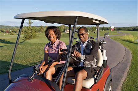 Couple in Golf Cart, Burlington, Ontario, Canada Stock Photo - Premium Royalty-Free, Code: 600-02701148