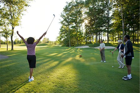 friends driving - Friends Playing Golf, Burlington, Ontario, Canada Stock Photo - Premium Royalty-Free, Code: 600-02701179