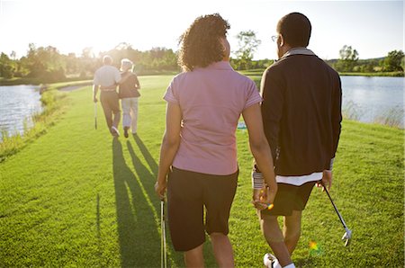 Friends Playing Golf, Burlington, Ontario, Canada Stock Photo - Premium Royalty-Free, Code: 600-02701186