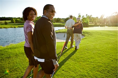 Friends Playing Golf, Burlington, Ontario, Canada Stock Photo - Premium Royalty-Free, Code: 600-02701187