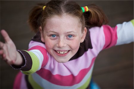 preteen girl pigtails - Portrait of Smiling Girl Stock Photo - Premium Royalty-Free, Code: 600-02724710