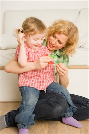 simsearch:600-01112884,k - Mother and Daughter Playing Stock Photo - Premium Royalty-Free, Code: 600-02756473