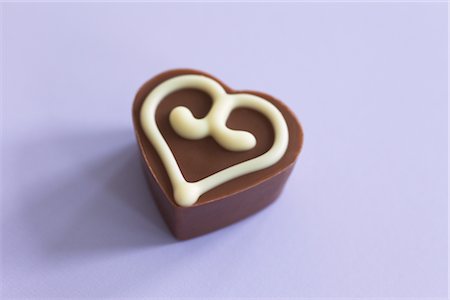 Still Life of Heart-Shaped Chocolate Stock Photo - Premium Royalty-Free, Code: 600-02756814