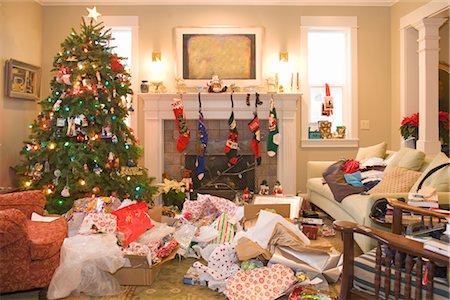 Messy Living Room After the Christmas Presents Have Been Opened Stock Photo - Premium Royalty-Free, Code: 600-02757086