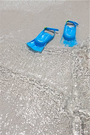 Blue Flippers in The Surf, Cayman Islands, Greater Antilles, Antilles Stock Photo - Premium Royalty-Free, Code: 600-02757605