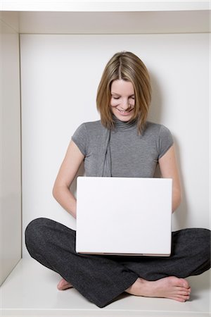 Businesswoman Using Laptop Computer Stock Photo - Premium Royalty-Free, Code: 600-02798111