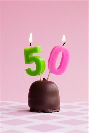 simsearch:700-02903782,k - Birthday Candles in Chocolate Marshmallow Cookie Stock Photo - Premium Royalty-Free, Code: 600-02801211