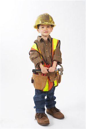 person standing cut out facing camera full length and one person - Boy Dressed Up as Construction Worker Stock Photo - Premium Royalty-Free, Code: 600-02828533