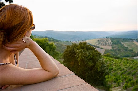 simsearch:600-05947909,k - Woman Looking Out, Radda in Chianti, Province of Siena, Tuscany, Italy Stock Photo - Premium Royalty-Free, Code: 600-02828577