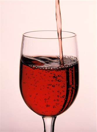 simsearch:600-02912202,k - Pouring Red Wine into Glass Stock Photo - Premium Royalty-Free, Code: 600-02885933